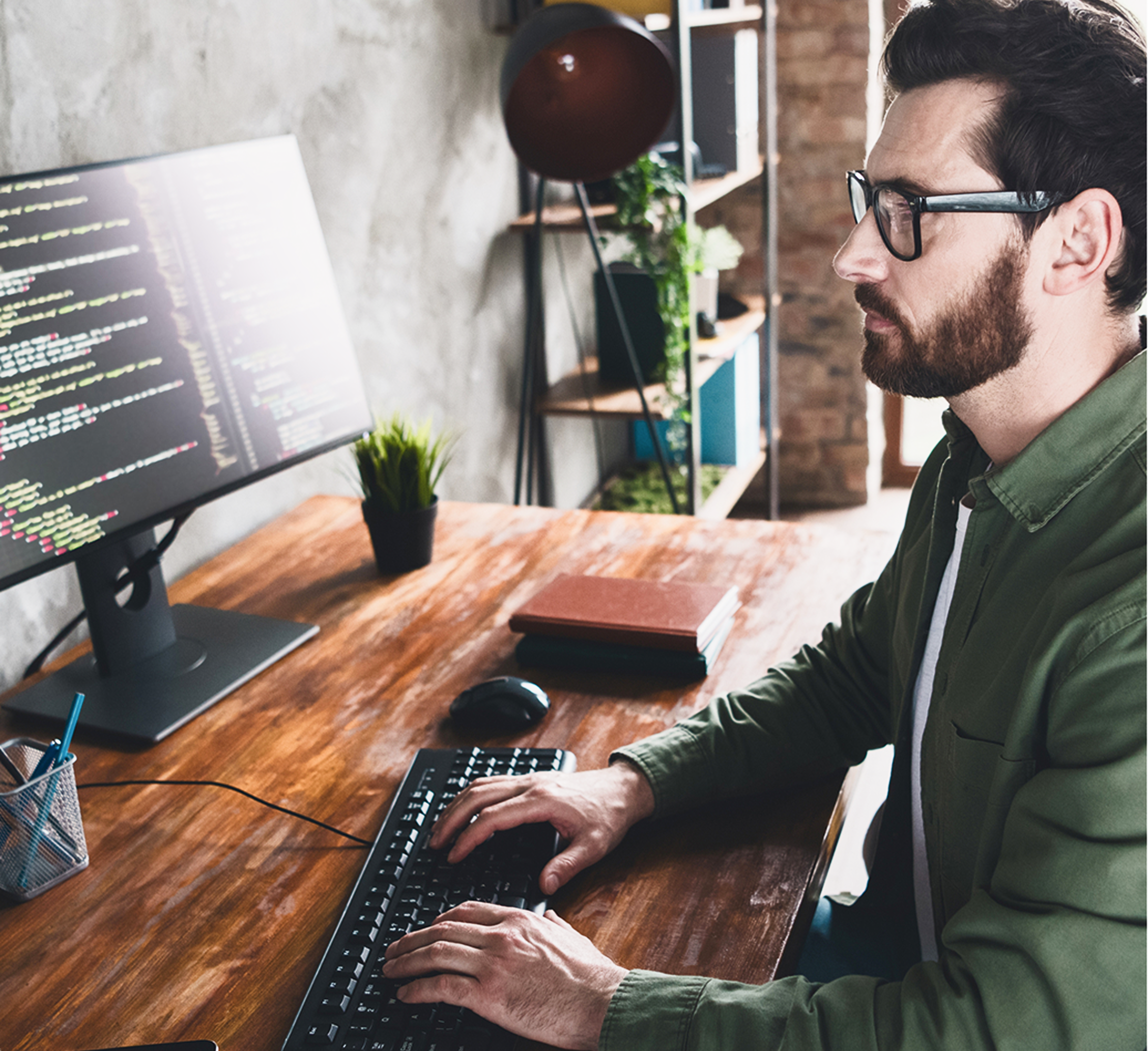 man_programmer_laptop_computer_office